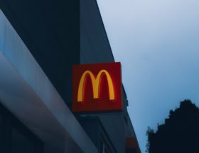 a close up of a mcdonald's sign on a building