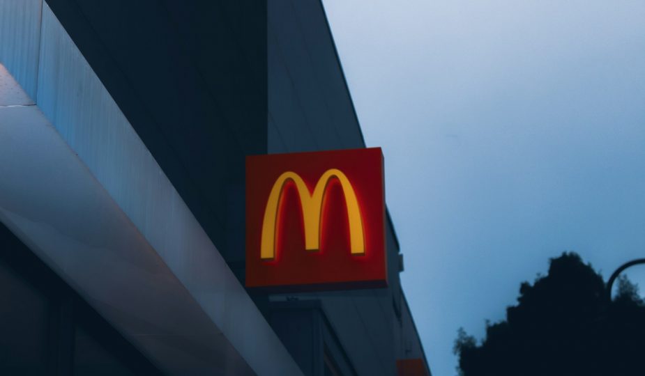 a close up of a mcdonald's sign on a building