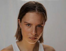 woman in white tank top